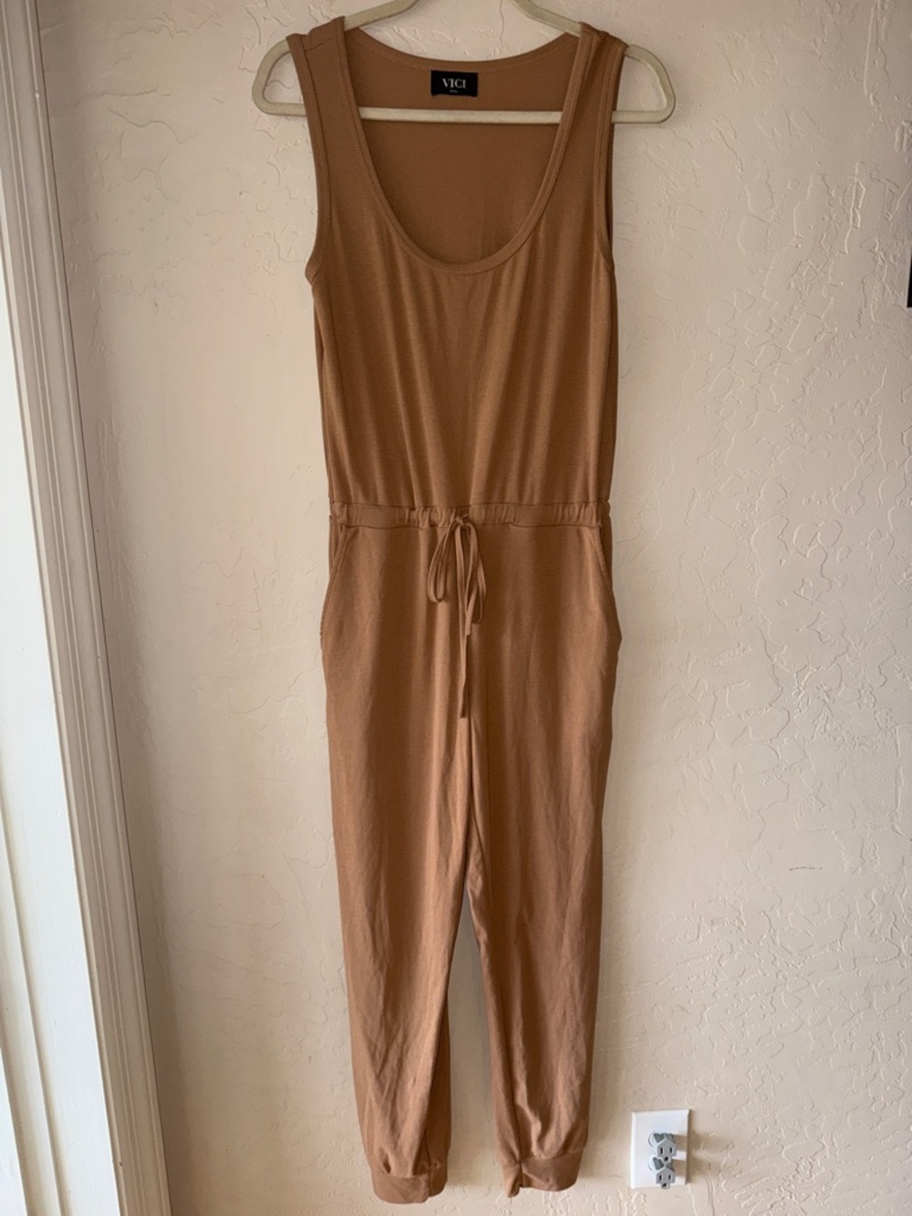Vici tan jumpsuit drawstring waist and pockets size small